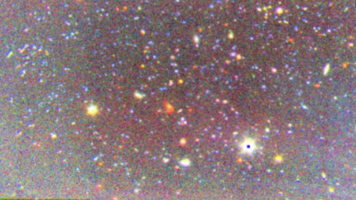 wisps of colored light on a black background
