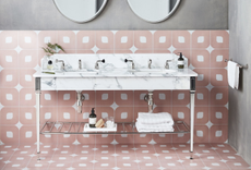 bathroom with pink tiles and marble vanity by drummonds