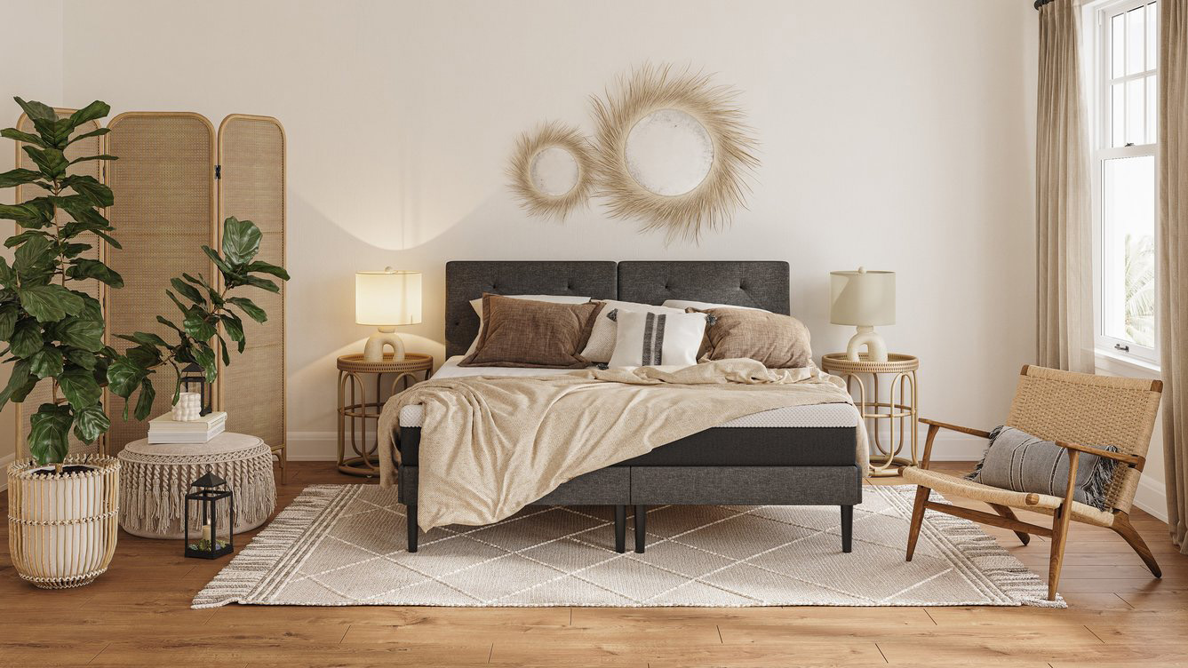 An image of the Emma Original Mattress US in a bohemian style bedroom, and dressed with cream and mink colored bedding and accessories