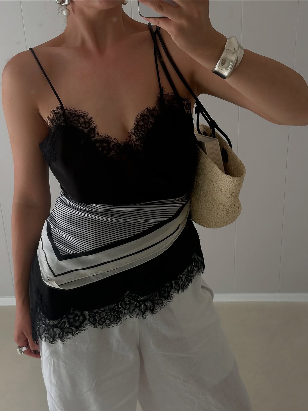 woman wearing black lace going out top outfit fall 2025