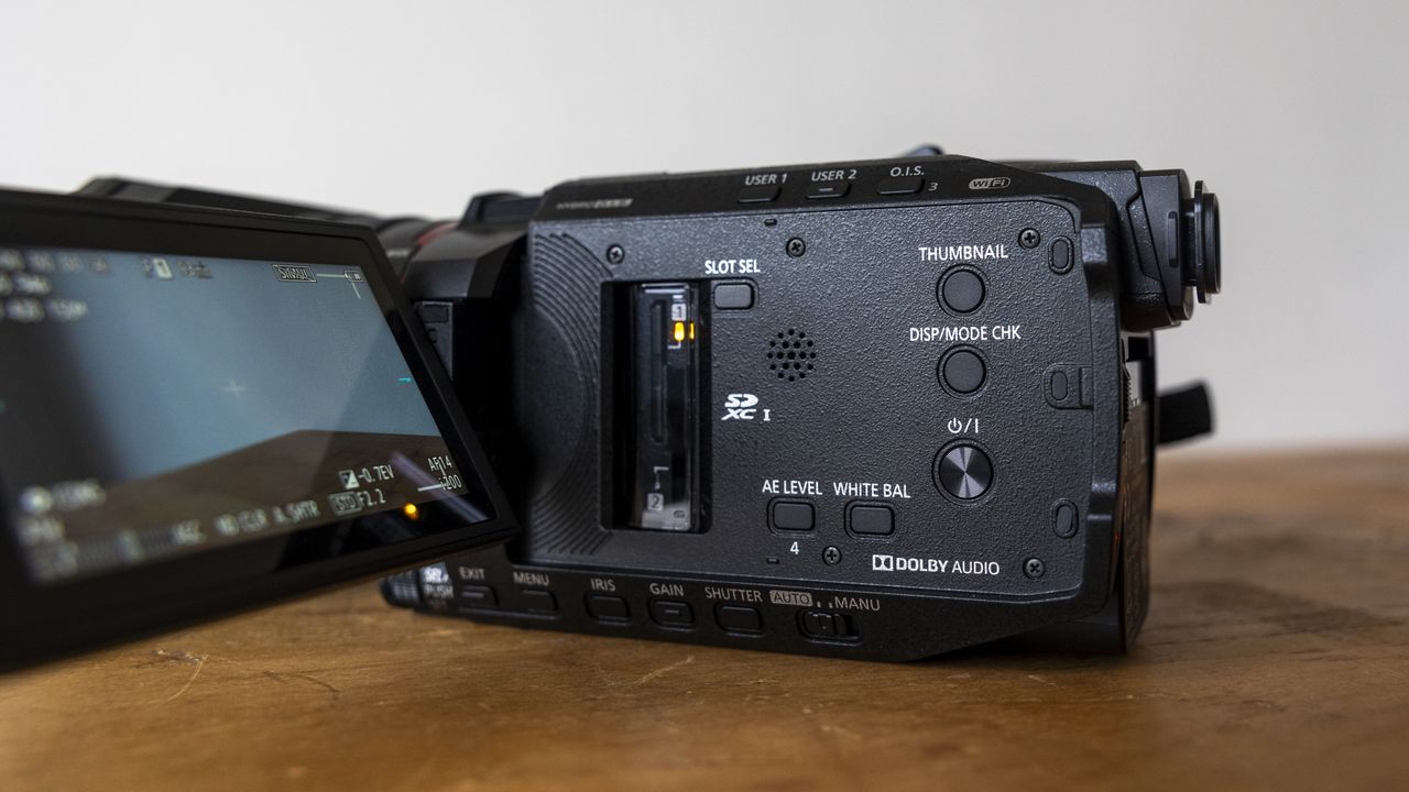 The Panasonic HC-X1500 camcorder on a wooden table