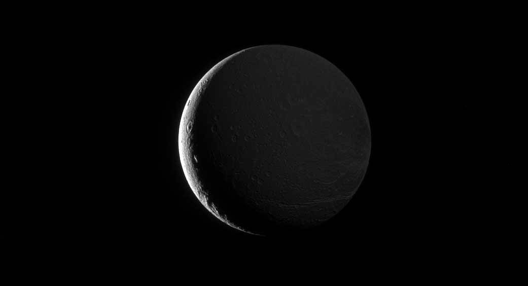 Saturn&#039;s Shine Illuminates Dione