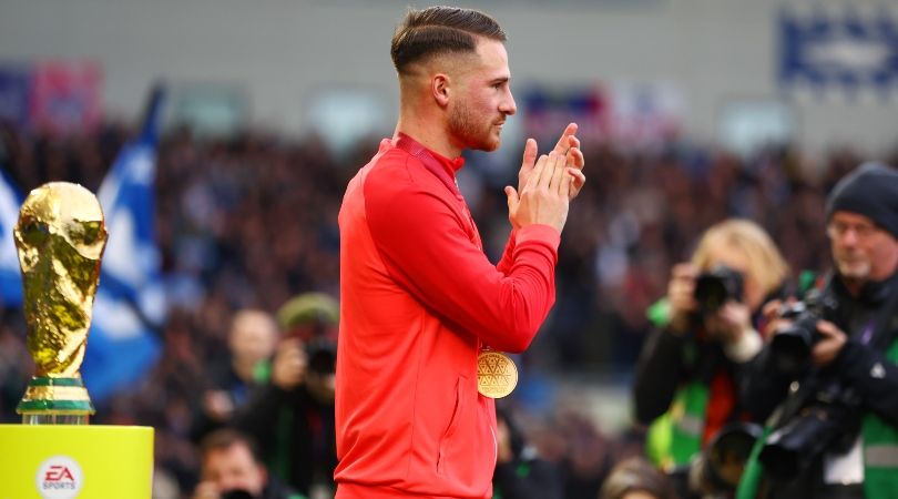 Brighton&#039;s Alexis Mac Allister applauds fans as he walks past the World Cup trophy ahead of the Seagulls&#039; Premier League game against Liverpool.