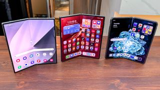 Huawei Mate XT Ultimate Design next to OnePlus Open and Galaxy Z Fold 6