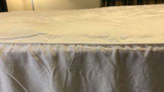 The Nolah Bamboo Mattress Pad on a bed