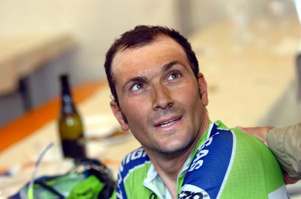 Basso covered in dirt after the rainy GP Carnago