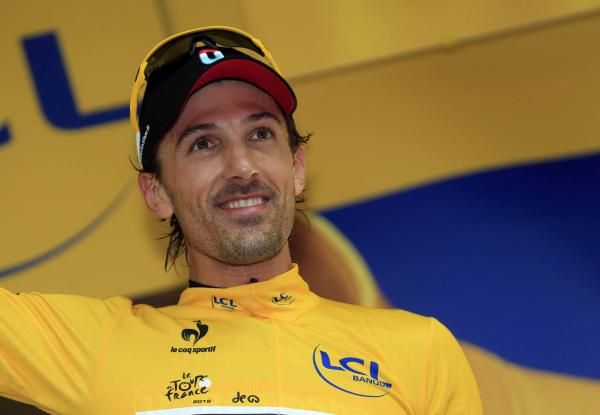 Fabian Cancellara (RadioShack-Nissan) in yellow.
