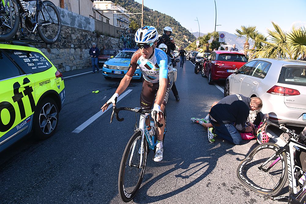 An AG2R rider passes the scene of Zurlo's crash