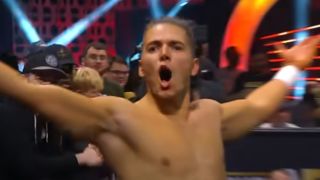 Sammy Guevara with his arms outstretched in AEW