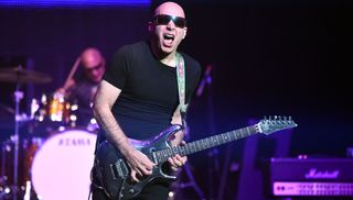 Joe Satriani performs onstage during the Experience Hendrix concert at City National Grove of Anaheim on October 09, 2019 in Anaheim, California