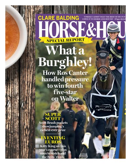 Horse & Hound magazine on a wooden table beside a cup of coffee