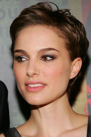 Natalie Portman is pictured with a swept back pixie cut at the Warner Bros. premiere of "V for Vendetta" at the Rose Theater on March 13, 2006 in New York City.