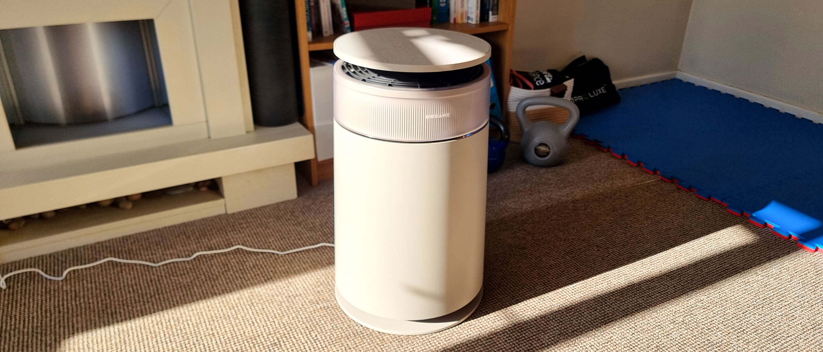 a picture of the Dreame FP10 Air Purifier standing in the middle of a living room