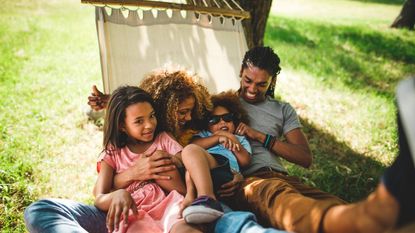 A happy family in a hammock