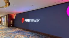 Pure Storage logo and branding pictured on a screen at the 2025 Pure//Accelerate conference in Las Vegas, Nevada.