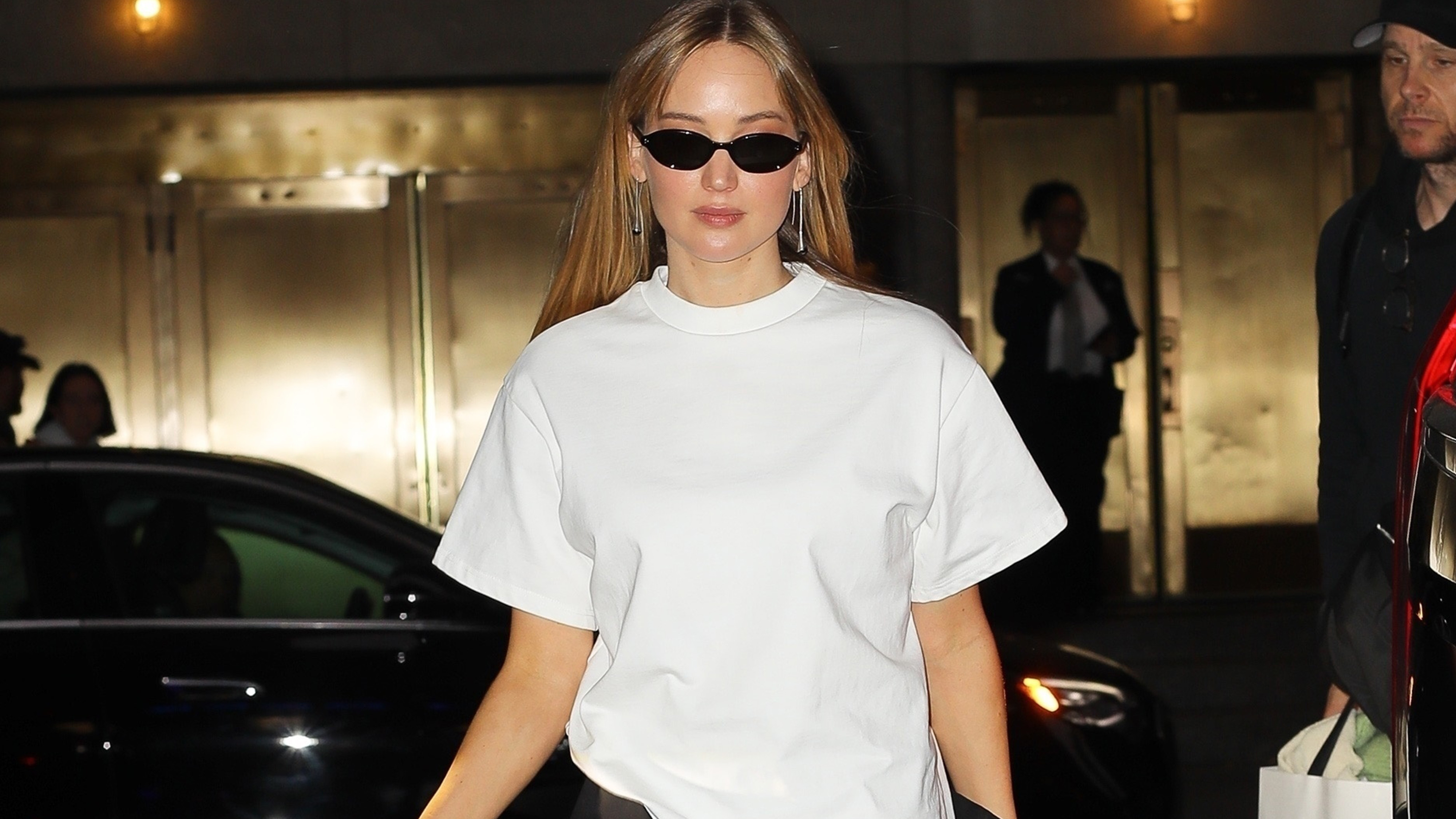 *EXCLUSIVE* Jennifer Lawrence turned heads in a chic black-and-white ensemble as she made her way to The Tonight Show Starring Jimmy Fallon in New York City. The actress kept it sleek and sophisticated, showing off her signature style.