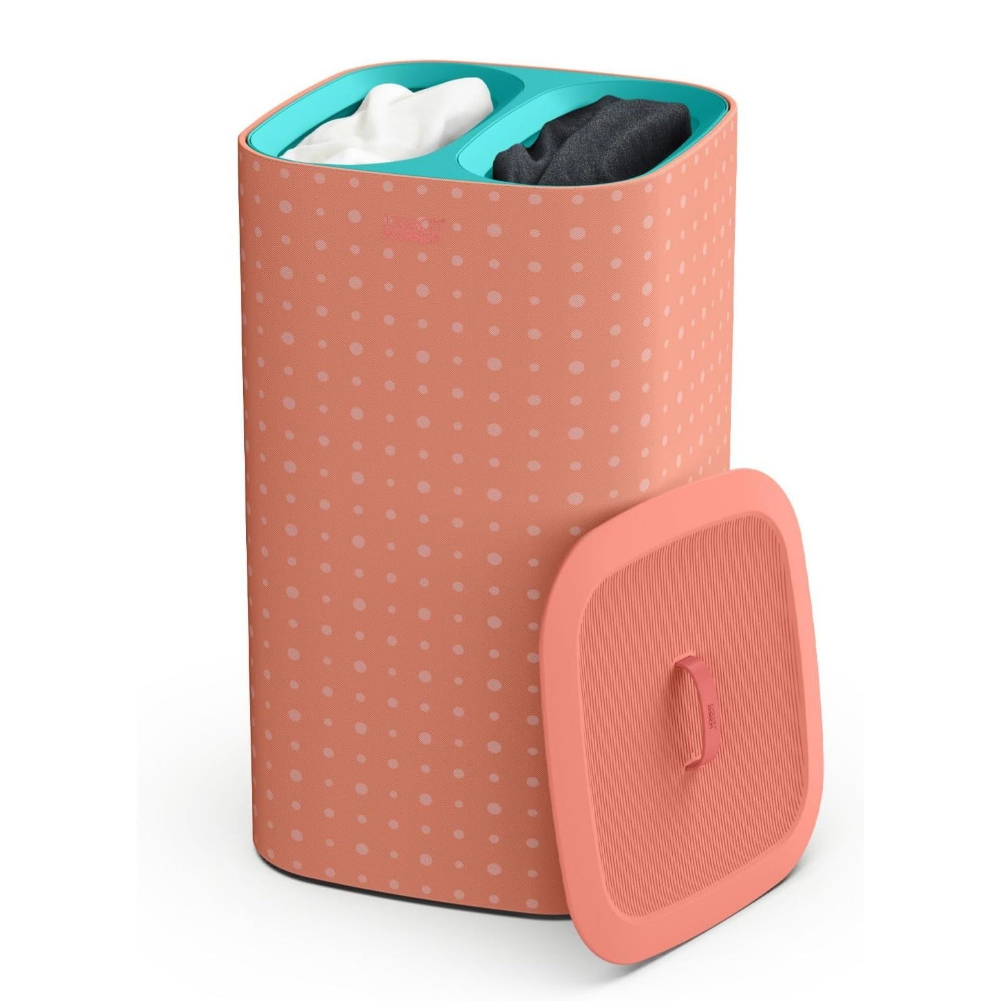 Joseph Joseph laundry basket in coral colour with white spots