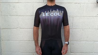 Image shows a rider wearing the Le Col Pro Indoor Jersey.