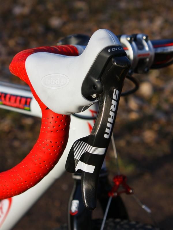 The SRAM Force DoubleTap levers are wrapped with Hudz aftermarket brake hoods.