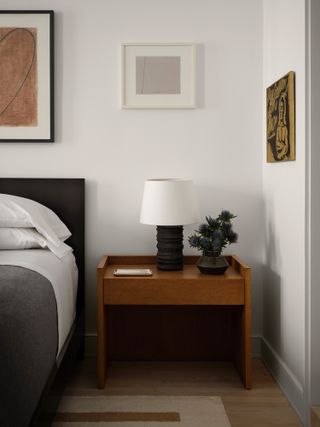 clive lonstein apartment in new york bedroom with timber bedside table