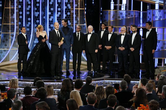 Jesse Armstrong accepts the Golden Globe for best drama series for HBO&#039;s &quot;Succession&quot;