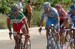 Paolo Bettini (Quick.Step) going hard with Haselbacher on his wheel
