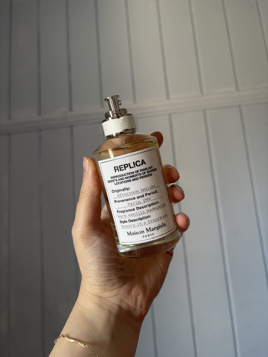 Mica Ricketts holding Maison Margiela Replica Afternoon Delight