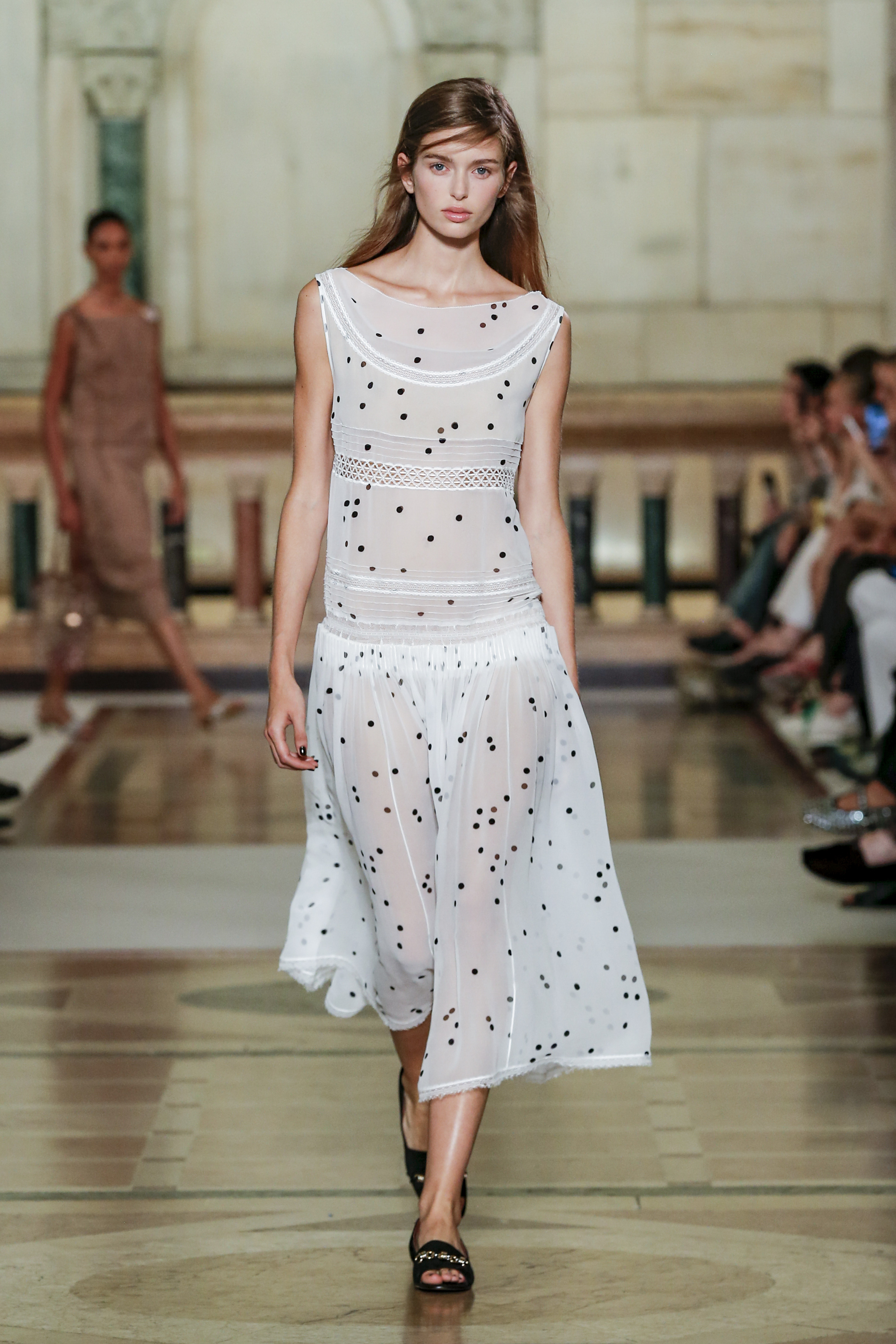 A model wore the polka-dots trend on the Tory Burch Spring 2026 runway