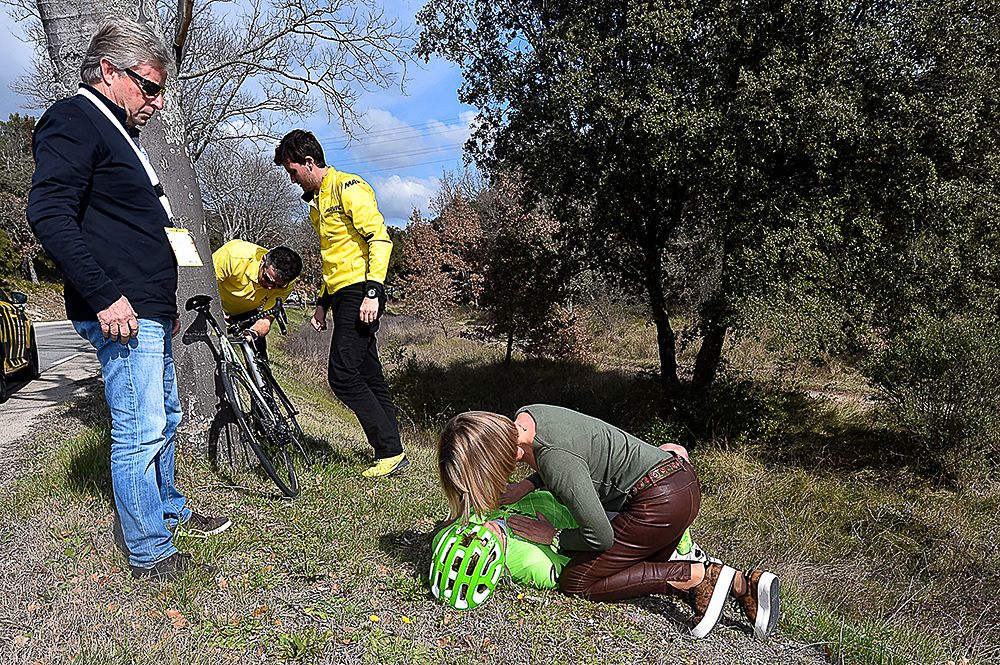 Staff attend to Cannondale Ruben Zepuntke after a crash