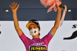 MORTEGLIANO ITALY JULY 09 Marianne Vos of Netherlands and Jumbo Visma Team Purple Points Jersey celebrates at podium during the 32nd Giro dItalia Internazionale Femminile 2021 Stage 8 a 1294km stage from San Vendemiano to Mortegliano Flowers GiroDonne UCIWWT on July 09 2021 in Mortegliano Italy Photo by Luc ClaessenGetty Images