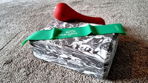 Image shows Meglio Latex-Free Resistance Bands resting on a yoga block.