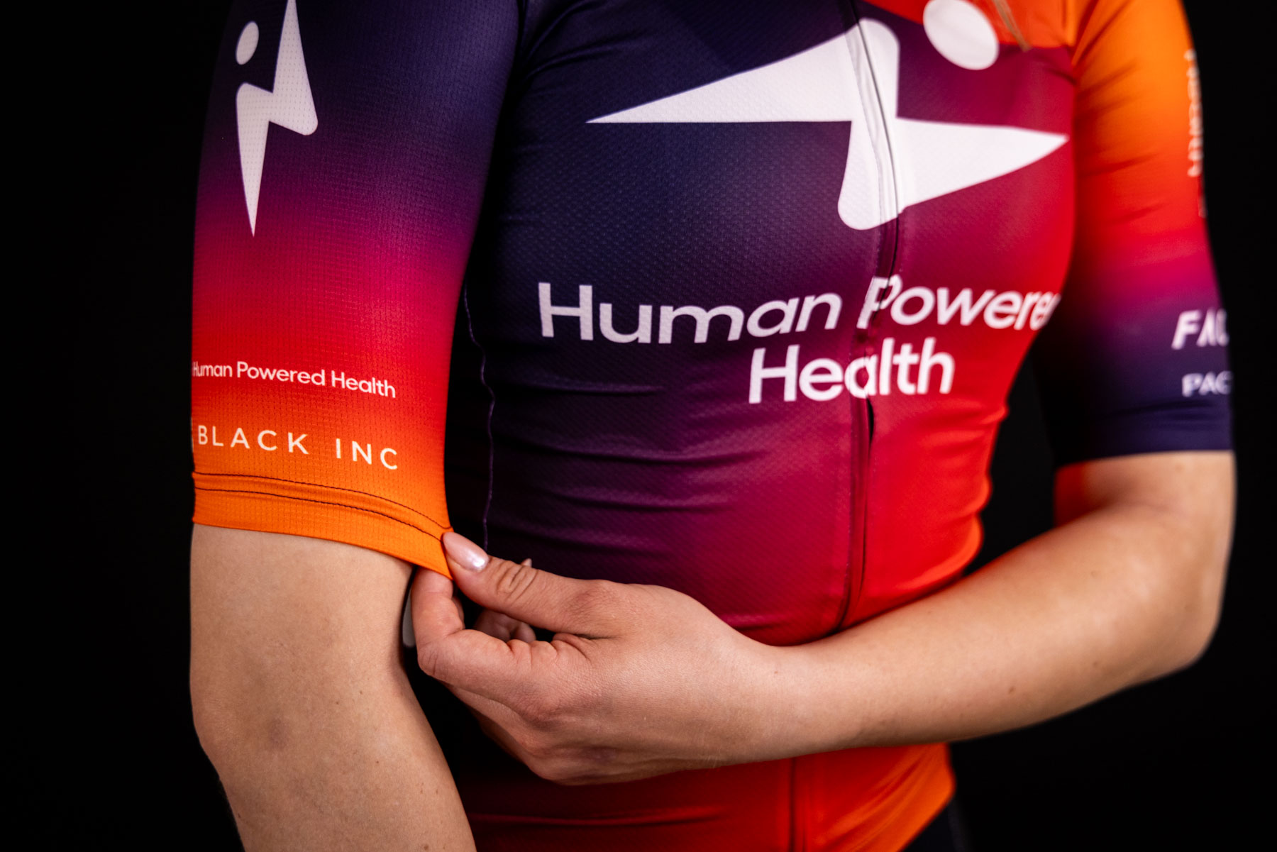 Human Powered Health moves purple to right side of jersey