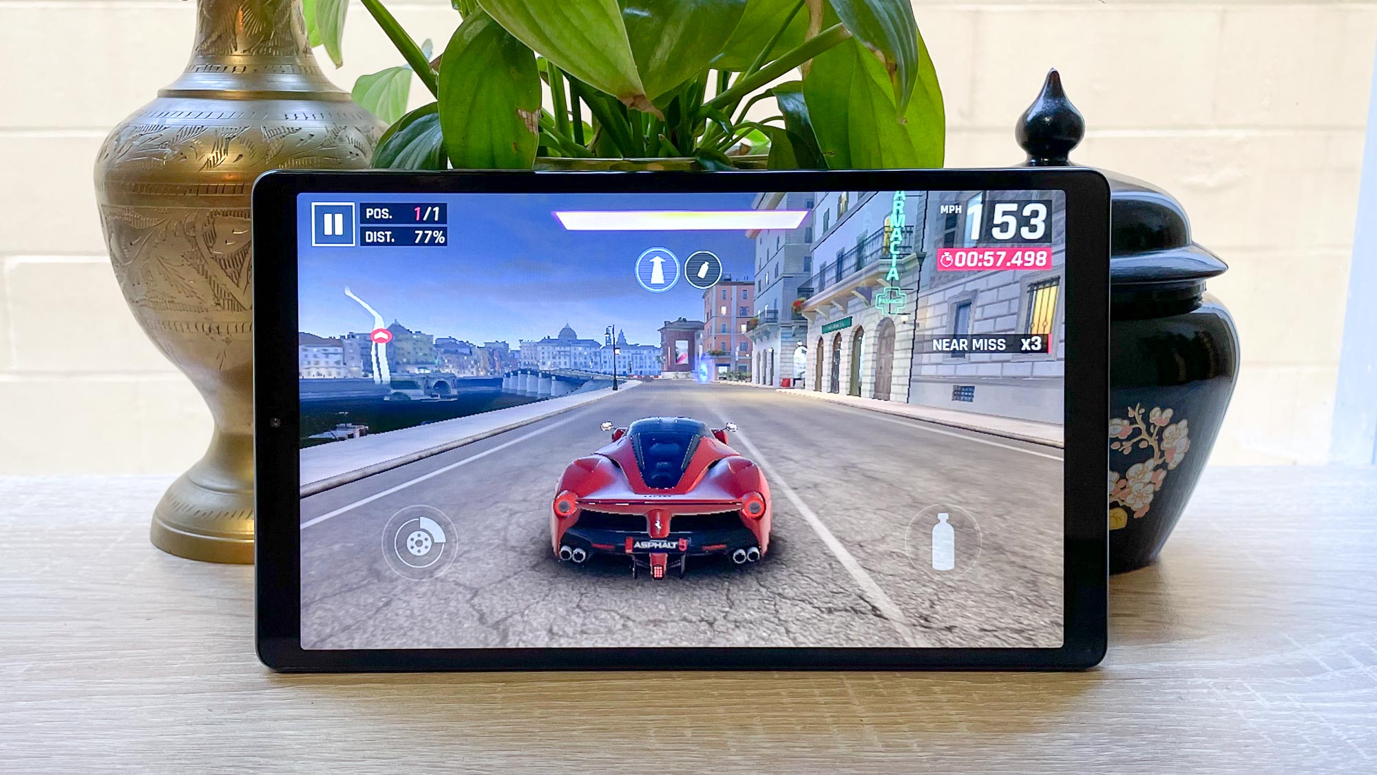 Lenovo Galaxy Tab A7 Lite on a desk, playing Asphalt 9