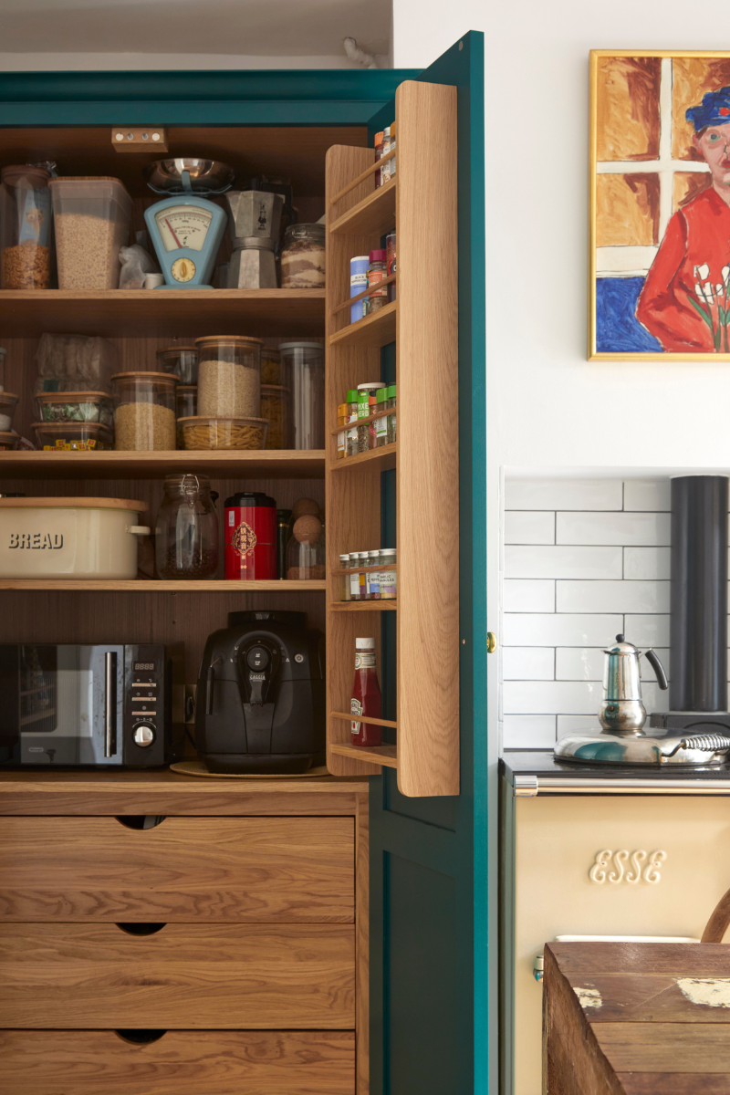 pantry with shelving and glass containers
