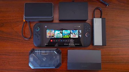 Nintendo Switch 2 on desk circled by third party docking stations.