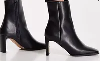 ASOS DESIGN Remmy set-back heeled boots in black, £38| ASOS