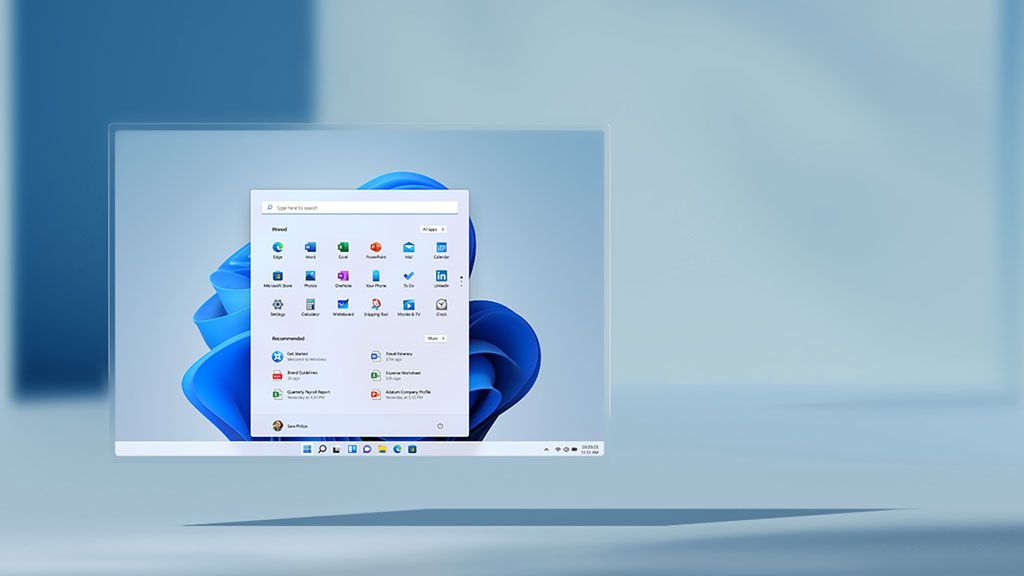 Windows 11 desktop screen floating on a blurred aqua background.