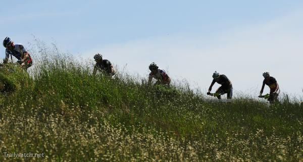 Elite men riding one of the many ridges in the cross country event