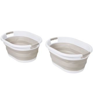Two grey and white collapsible laundry baskets