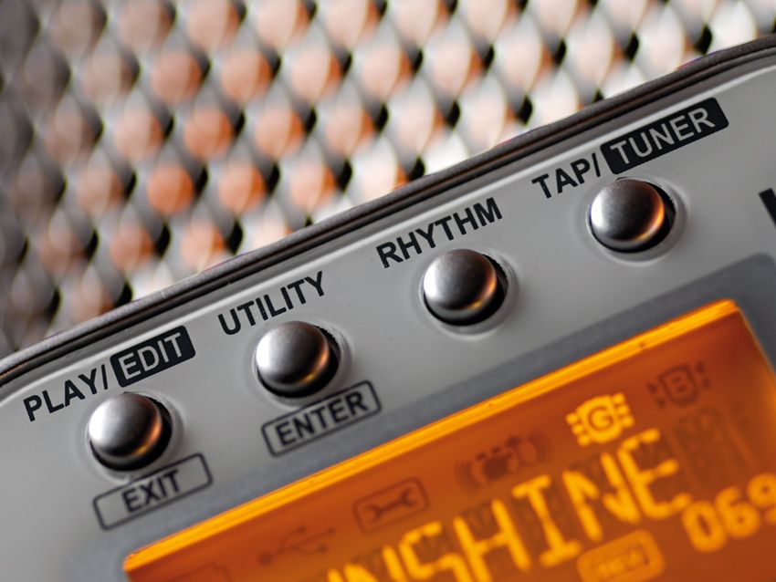 The Mini's simple design features two sets of four buttons and a rotary dial.
