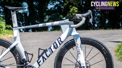 A grey and white Factor One road bike