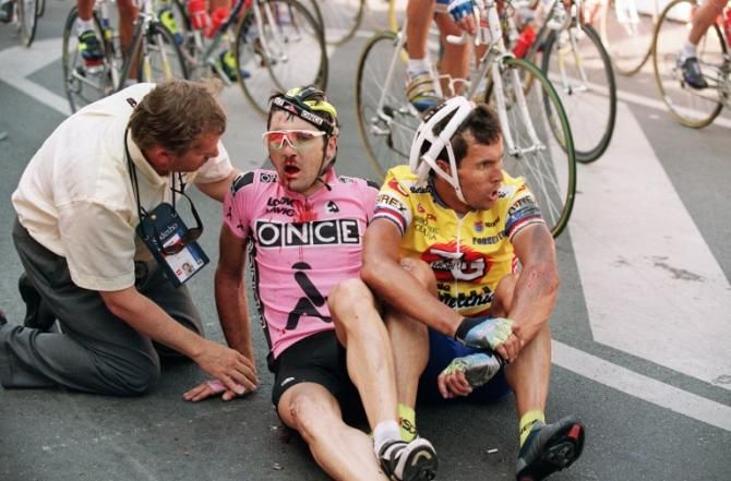 Laurent Jalabert and Fabiano Fontanelli in a daze after crashing in the final sprint of stage 1 in the 1994 Tour because of a policeman taking a photo.