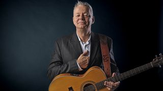 Tommy Emmanuel photographed with his Maton Custom EGB808 acoustic guitar in London, on October 27, 2014.