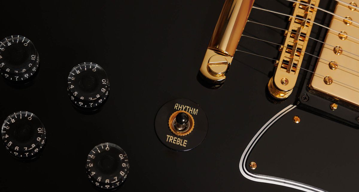 Gibson RD Custom: the cult-classic electric guitar returns in an Ebony finish, with the full Custom aesthetic of block inlays on an ebony fingerboard, multi-ply binding, and gold hardware and pickup coverings.