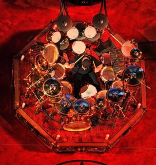 Neil Peart of the band Rush performs at Bridgestone Arena on May 1, 2013 in Nashville, Tennessee