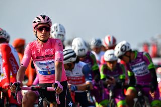 PIANCAVALLO ITALY OCTOBER 18 Start Joao Almeida of Portugal and Team Deceuninck QuickStep Pink Leader Jersey Base Aerea Rivolto Peloton during the 103rd Giro dItalia 2020 Stage 15 a 185km stage from Base Aerea Rivolto Frecce Tricolori to Piancavallo 1290m girodiitalia Giro on October 18 2020 in Piancavallo Italy Photo by Stuart FranklinGetty Images