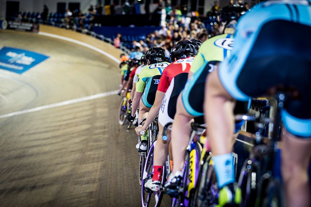 Women line up on the rails before the elimination race.