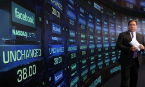A screen displays Facebook shares moments before it went public last week: The popular social network's bungled IPO could actually lead to a calmer IPO market with greater profits for investo