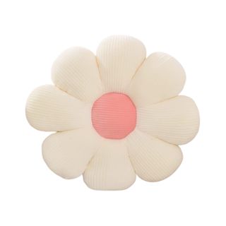 A white and pink flower pillow