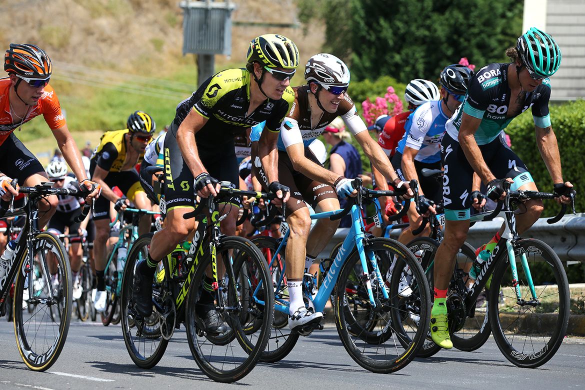Daryl Impey springs out of the saddle